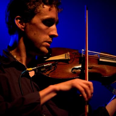 Photo of or album cover associated with Colm Mac Con Iomaire